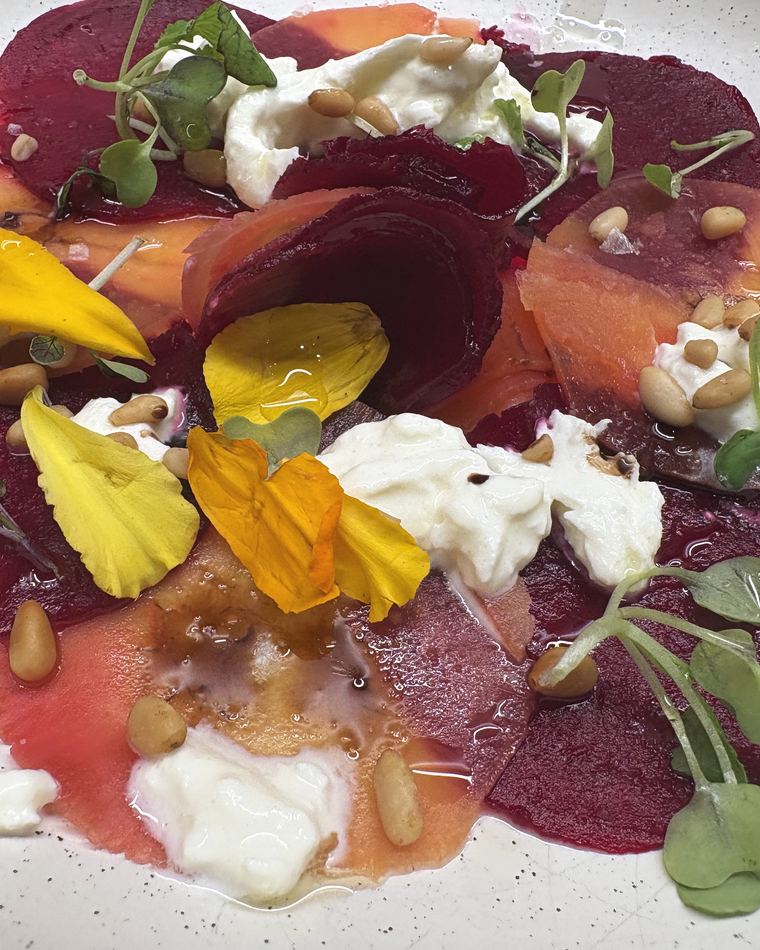 Beetroot and cured salmon carpaccio with burrata and marigold